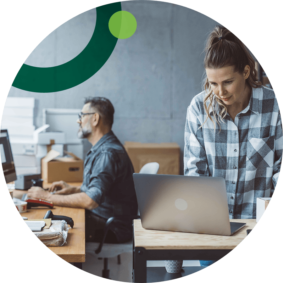 Small business owners using computers