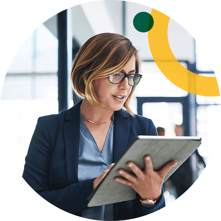 Business women reviewing online document on tablet