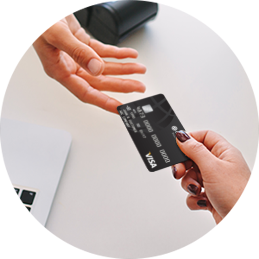 Business Credit Card being handed to vendor
