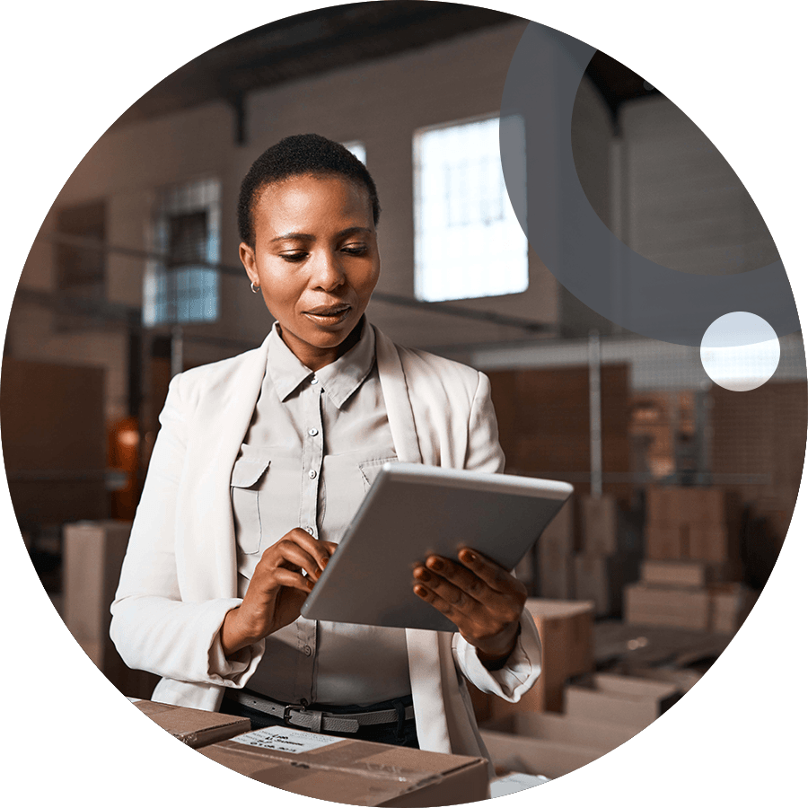 Business owner looking at tablet inventory 