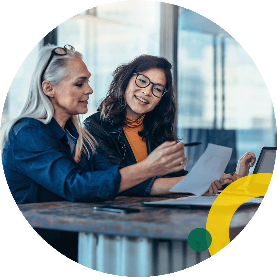 Business women reviewing paperwork