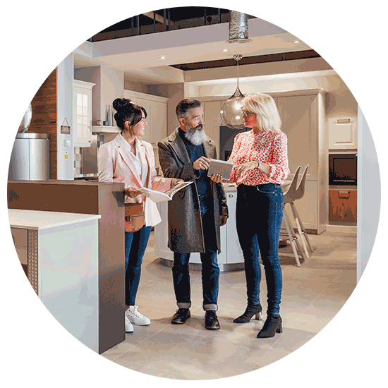 Couple at a store reviewing options for kitchen remodeling.