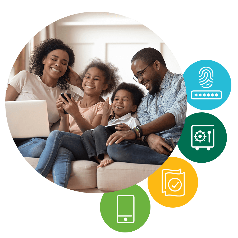 Family of 4 using laptop tablet and mobile phone together on couch