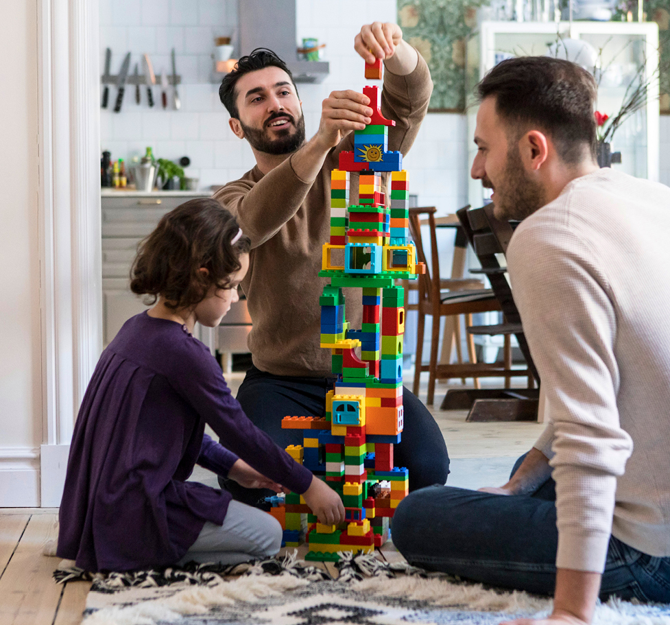Family playing a friendly game at home.