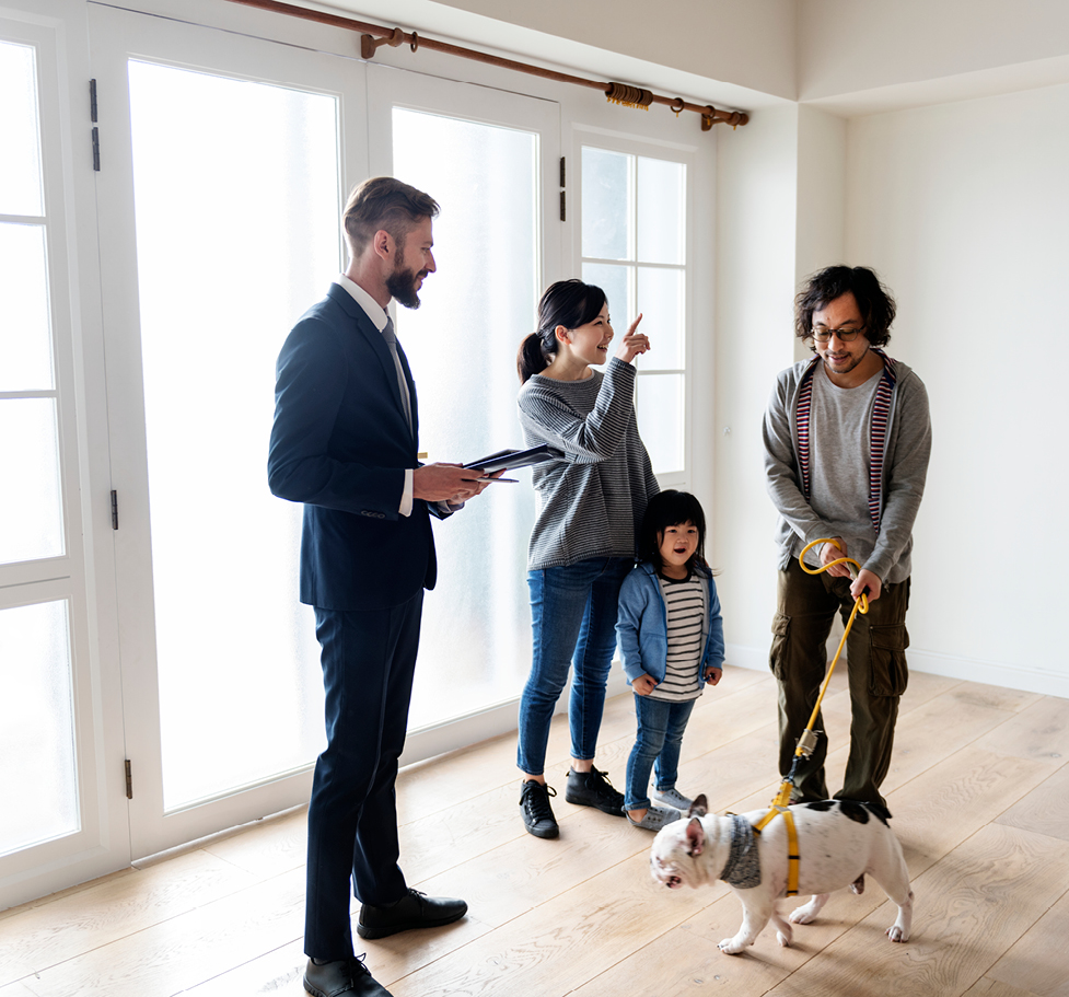 Family looking at their new home.